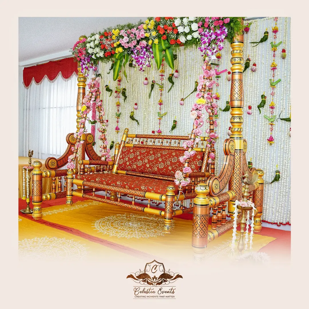 Flower-wrapped wooden swing for a baby shower